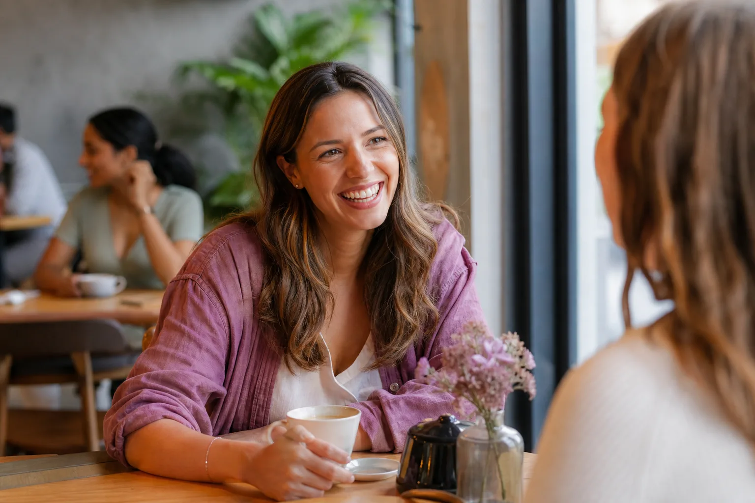 Woman meeting a man for coffee in central Christchurch